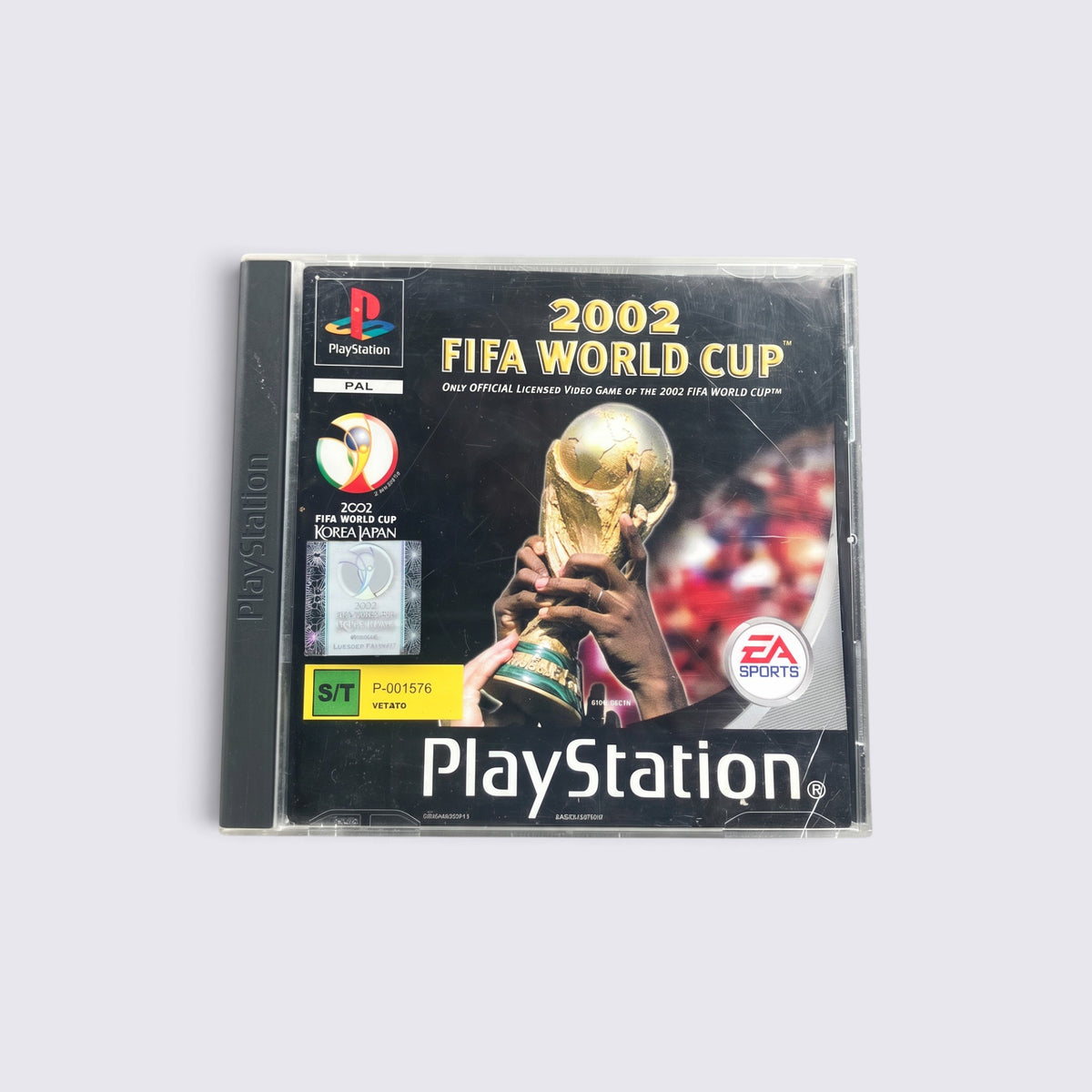 MrPixel 2002 FIFA World Cup PlayStation video game case featuring the iconic gold trophy on the cover art.