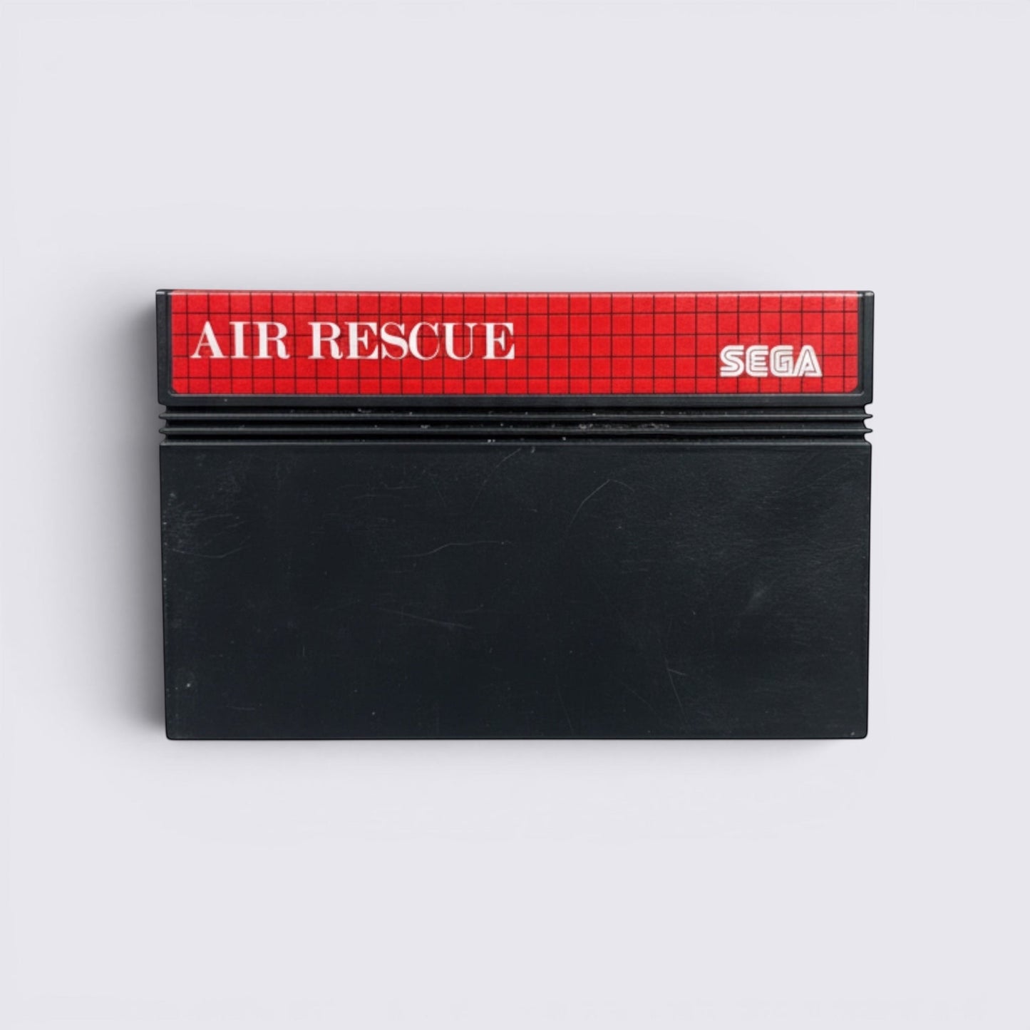 MrPixel Air Rescue Sega arcade game cartridge with a black casing and red grid label.