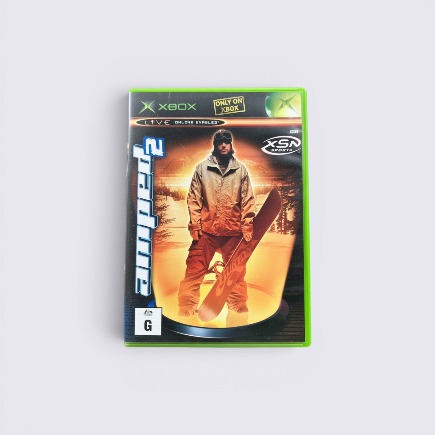 MrPixel Amped 2 snowboarding video game for Xbox featuring a snowboarder on the cover art