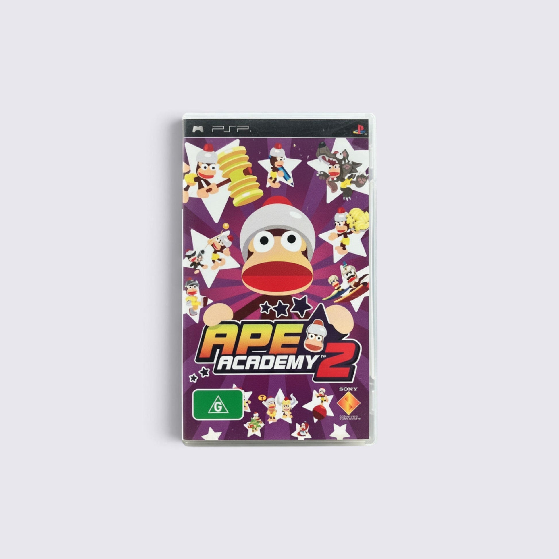 MrPixel Ape Academy 2 PSP game case featuring colorful monkey characters on a purple star-patterned background