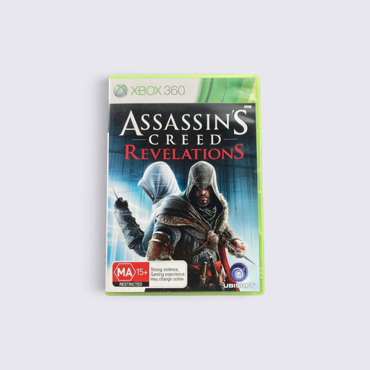 MrPixel Assassin's Creed: Revelations Xbox 360 game case featuring Ezio Auditore and Altair in a vibrant setting.