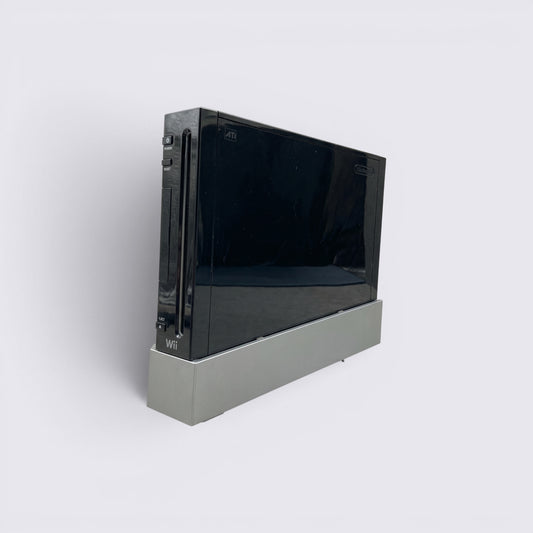 MrPixel black Nintendo Wii home gaming console standing vertically on a grey stand against a neutral background.