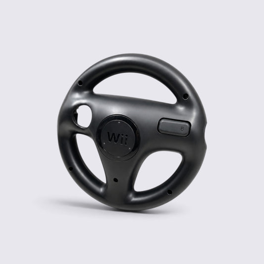 MrPixel black Nintendo Wii Wheel steering accessory for motion-controlled racing games on a light grey background.
