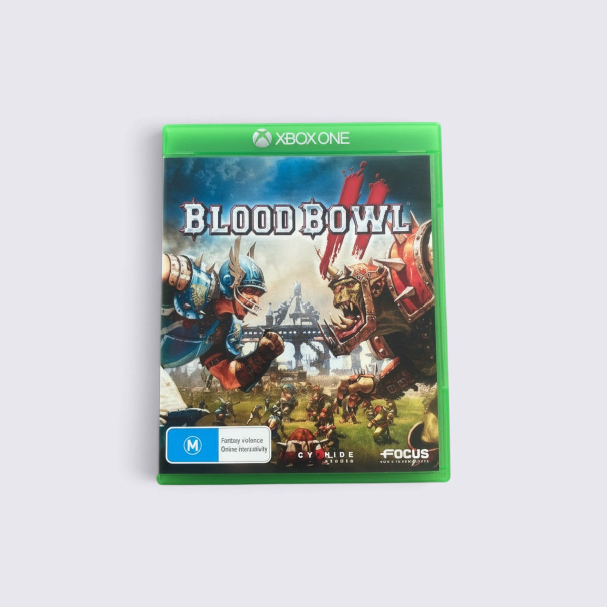 MrPixel Blood Bowl II Xbox One game case featuring fantasy football characters in a brutal match on a stadium field.