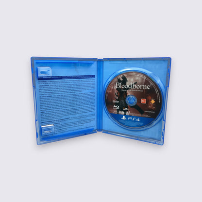 MrPixel Bloodborne Game of the Year Edition PS4 disc inside an open blue plastic game case.