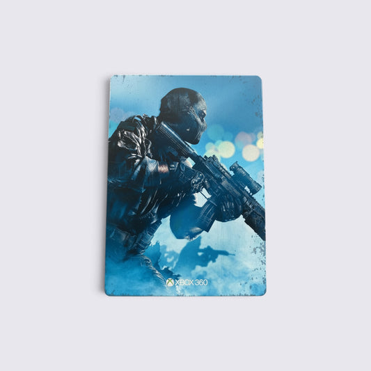 MrPixel Call of Duty: Ghosts Steelbook Edition for Xbox 360 featuring a soldier in a mask on a blue metal case