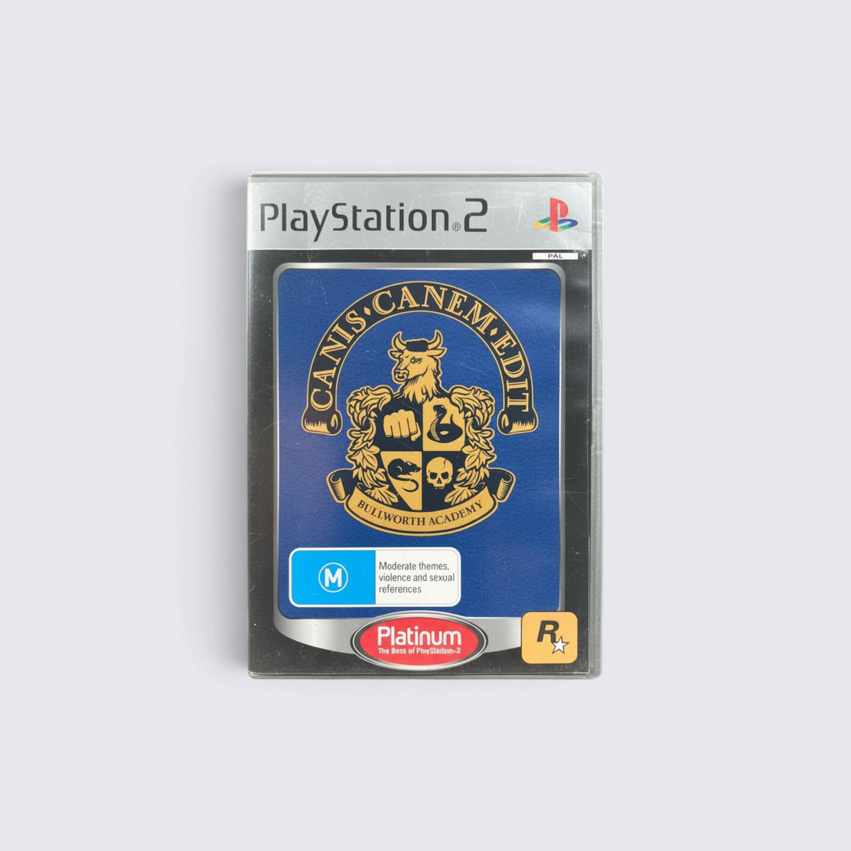 MrPixel Canis Canem Edit Platinum edition game for PlayStation 2 featuring the Bullworth Academy crest cover art