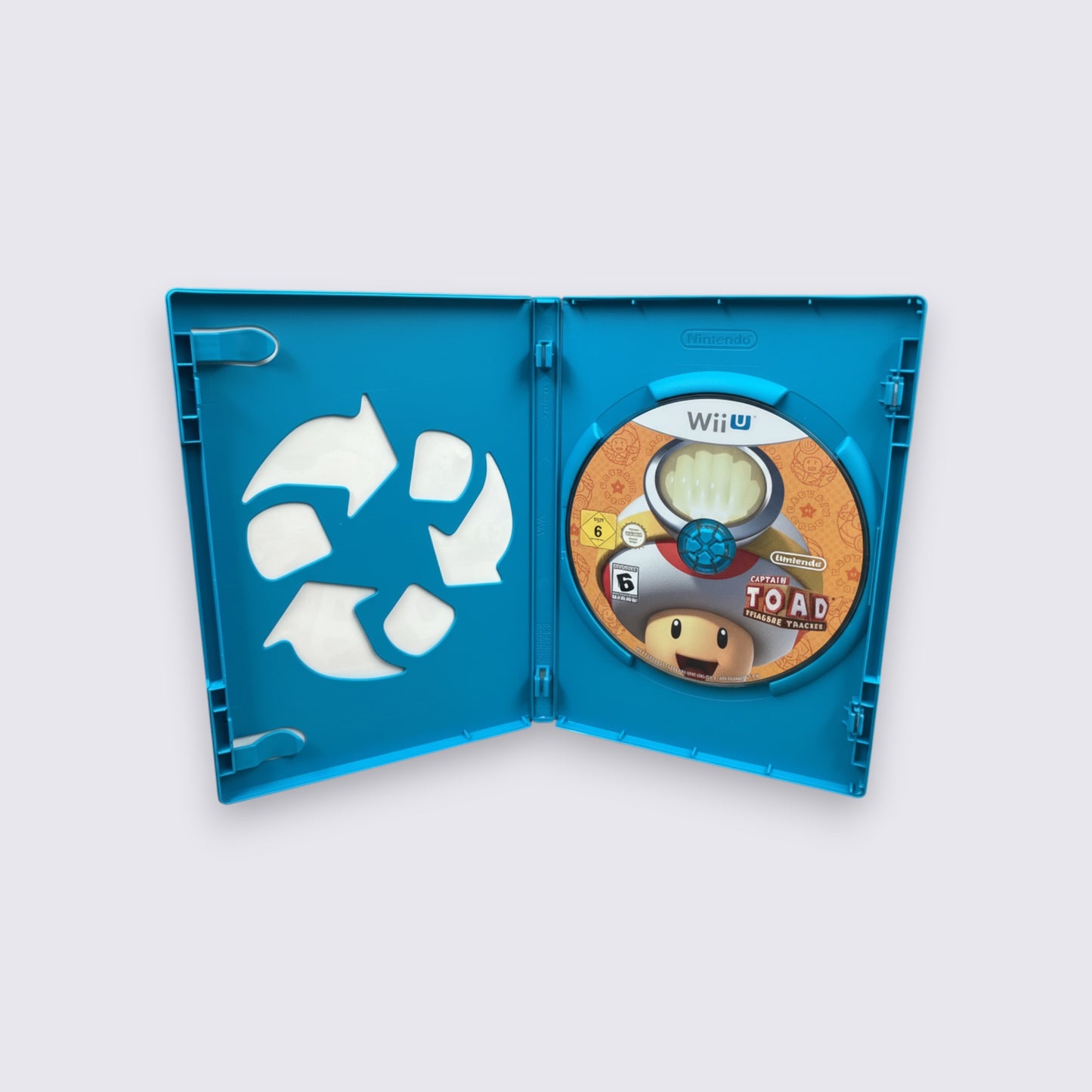 MrPixel Captain Toad: Treasure Tracker Wii U game disc inside a blue plastic case with a recycling symbol cutout.