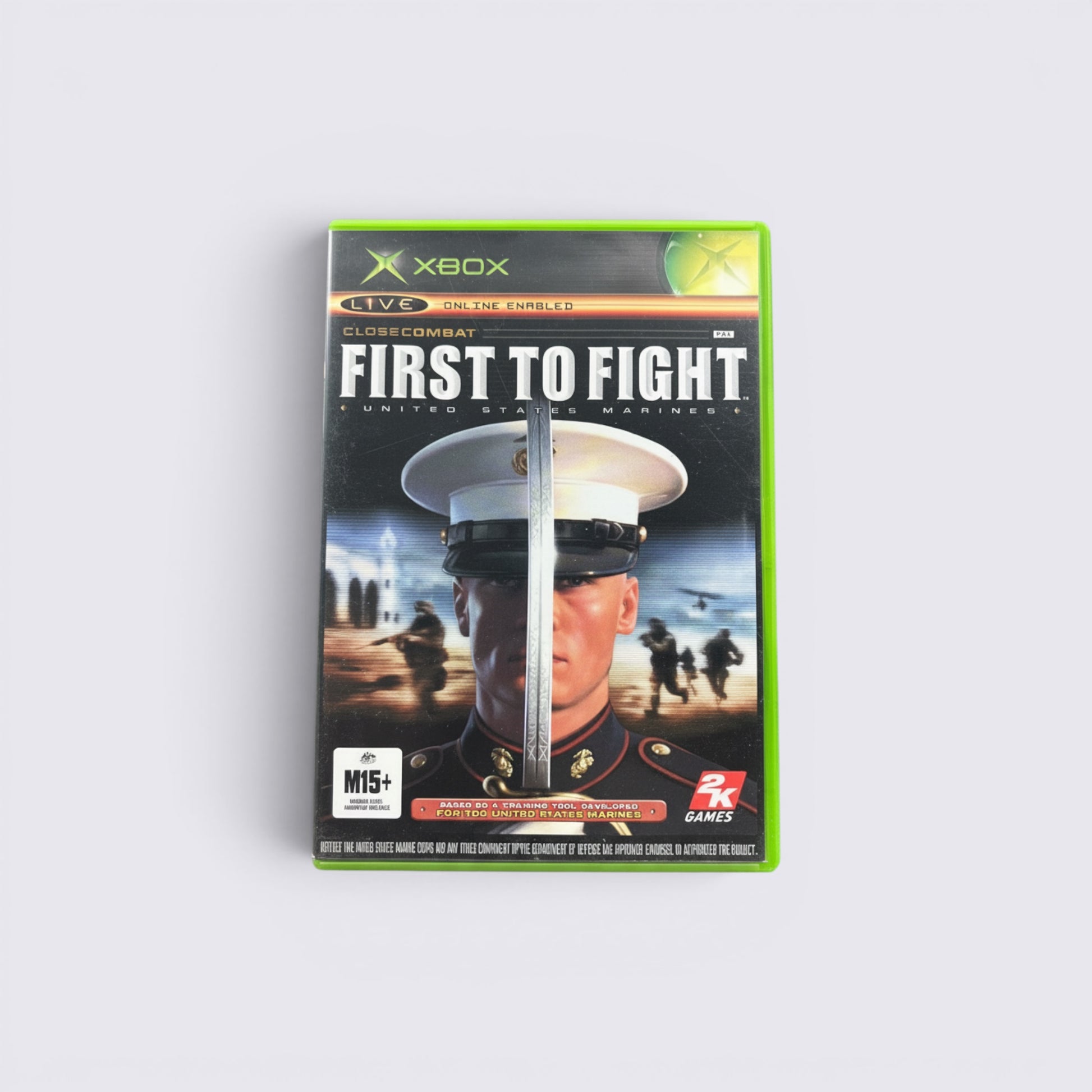MrPixel Close Combat First to Fight Xbox game case featuring a US Marine in dress blues with a sword overlay.