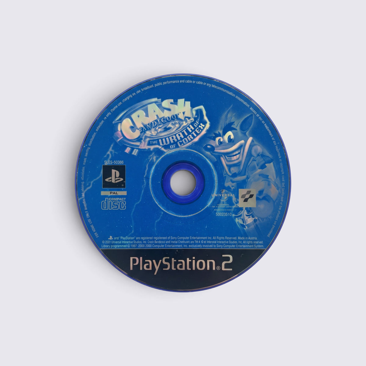 MrPixel Crash Bandicoot: The Wrath of Cortex game disc for PlayStation 2 featuring Crash and blue branding.