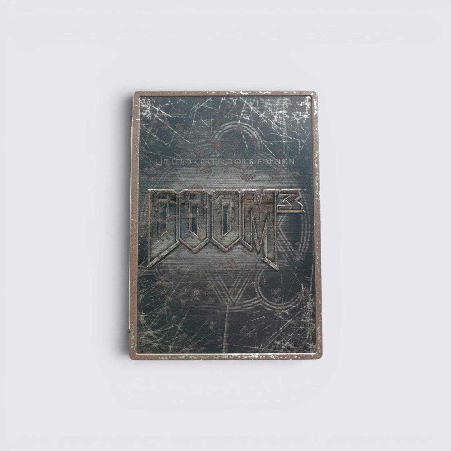 MrPixel Doom 3 Limited Collector's Edition metal game case with a distressed, weathered dark finish.