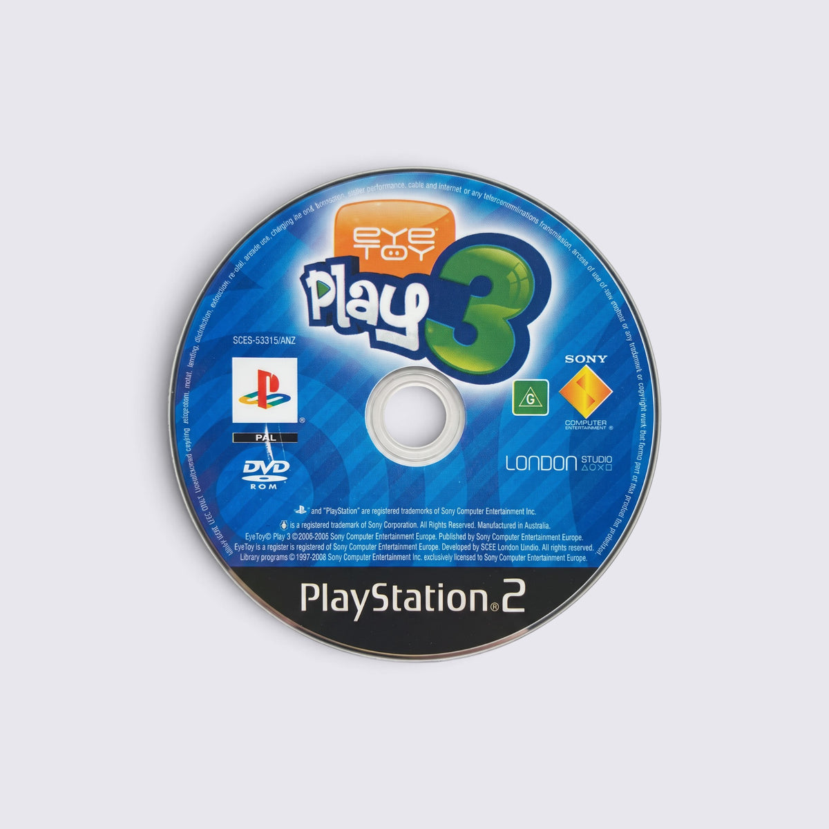 MrPixel EyeToy Play 3 PlayStation 2 game disc with blue and white branding on a plain background.