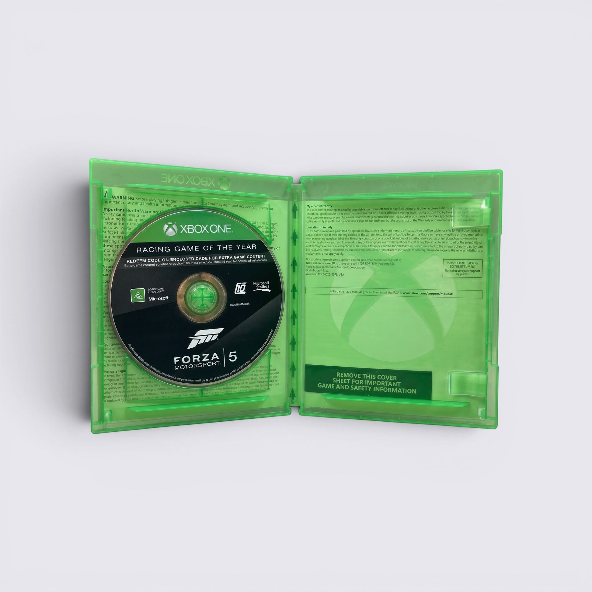 MrPixel Forza Motorsport 5 Racing Game of the Year Edition disc inside an open green Xbox One plastic game case