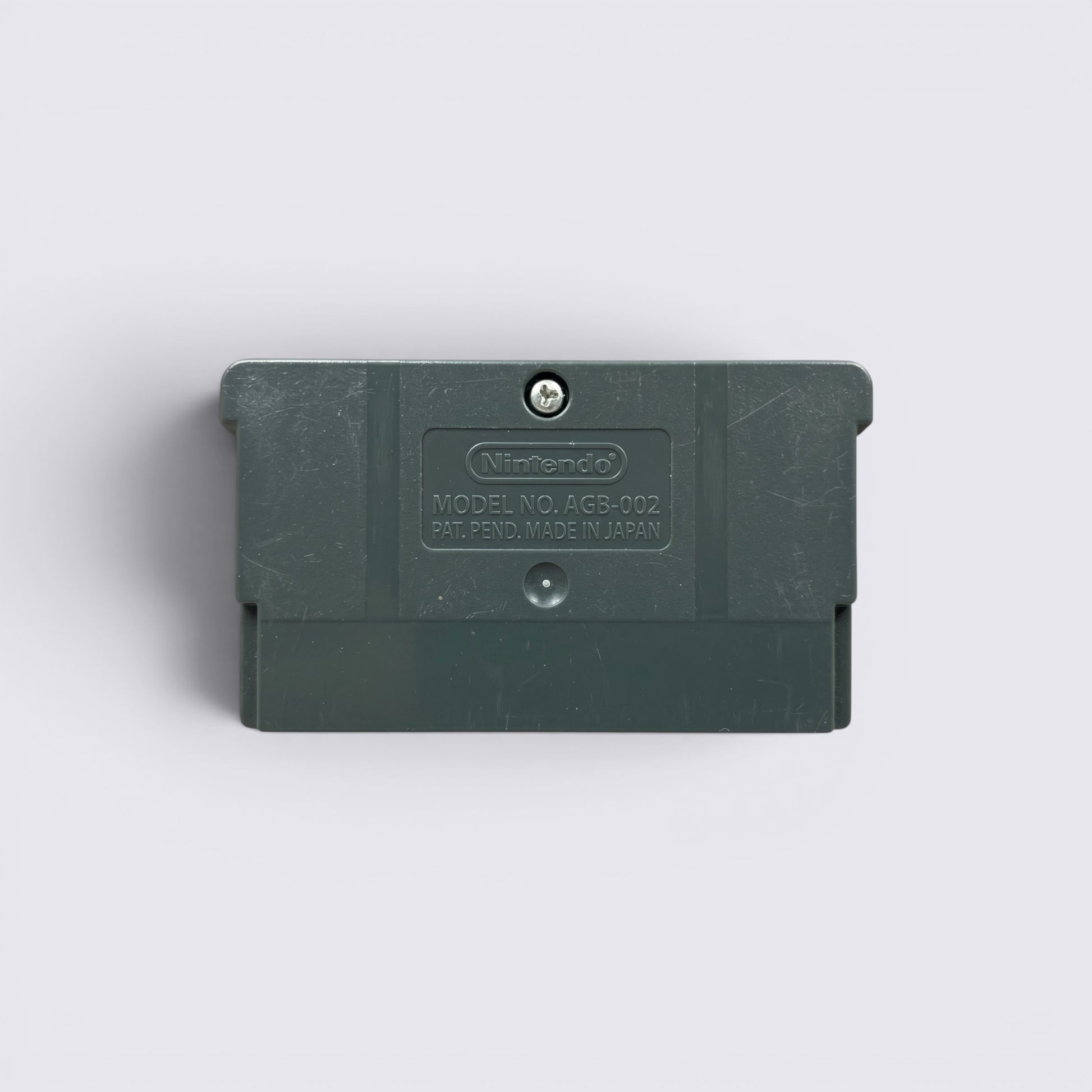 Back view of a grey MrPixel Game Boy Advance game cartridge showing the Nintendo logo and model number AGB-002.