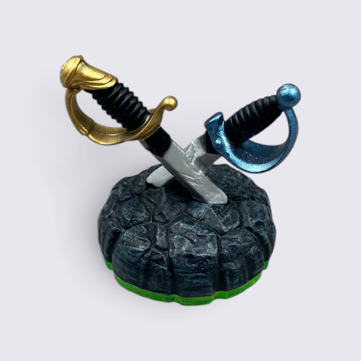 MrPixel Ghost Swords Skylanders figure featuring crossed gold and blue spectral swords on a textured stone base.