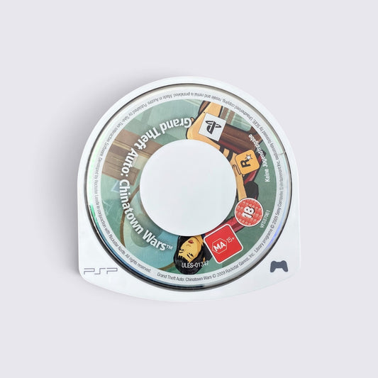 MrPixel Grand Theft Auto: Chinatown Wars PSP game disc with stylized comic book art and MA 15+ rating label.