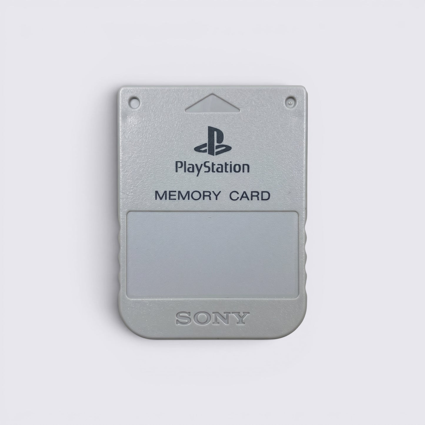 MrPixel grey Sony PlayStation 1 memory card for saving game progress on original PS1 consoles.