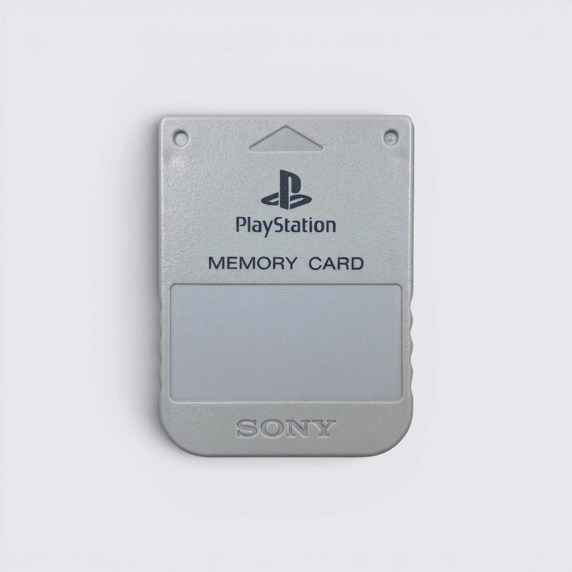 MrPixel grey Sony PlayStation 1 memory card for saving game progress on original PS1 consoles.