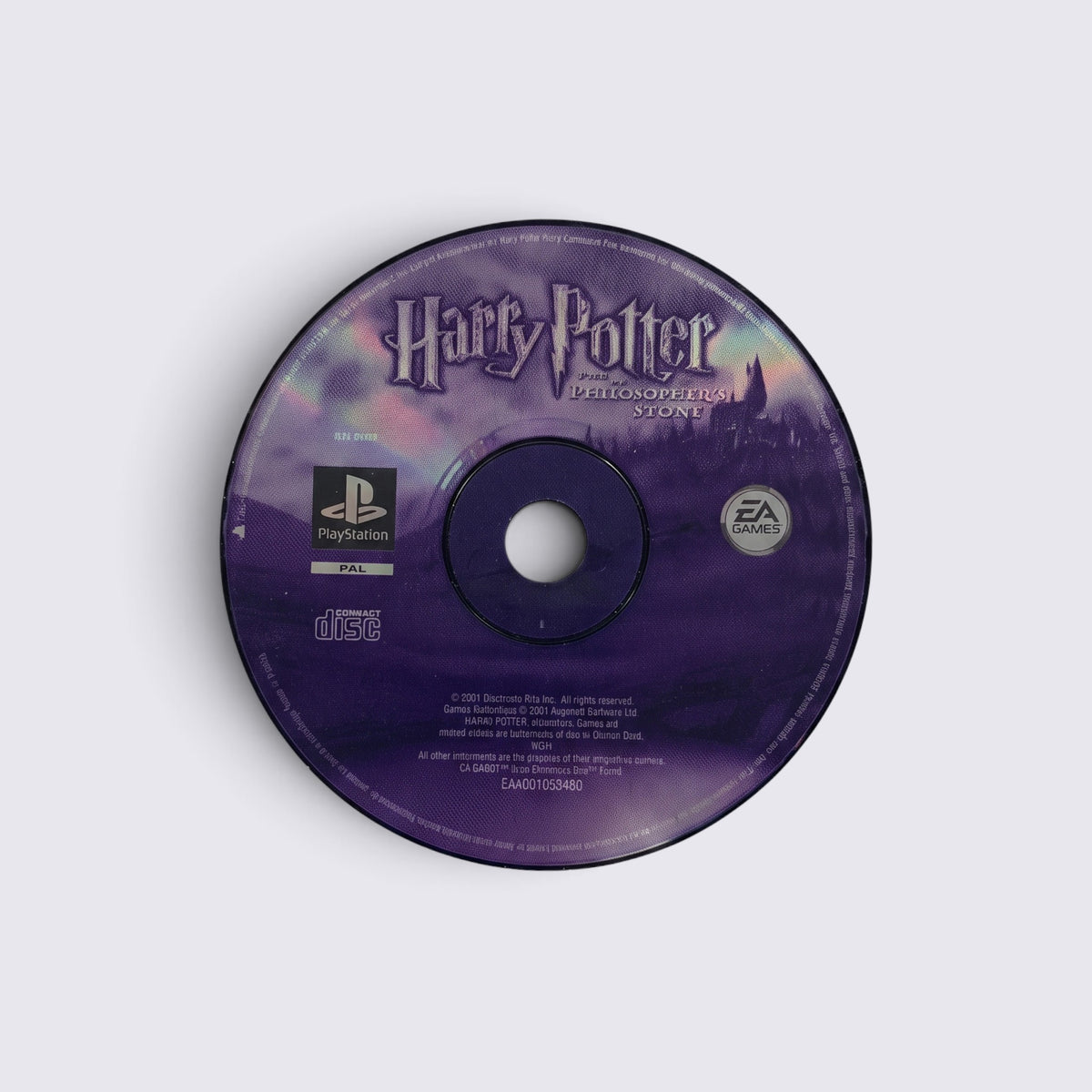 MrPixel Harry Potter and the Philosopher's Stone PlayStation game disc with purple branding and Hogwarts castle art.