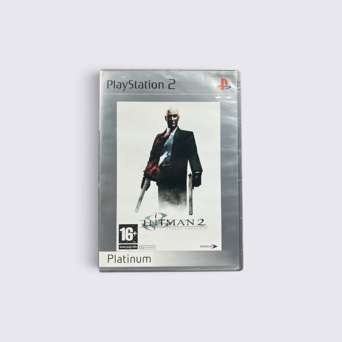 MrPixel Hitman 2 Silent Assassin Platinum edition game for PlayStation 2 featuring Agent 47 on the cover art