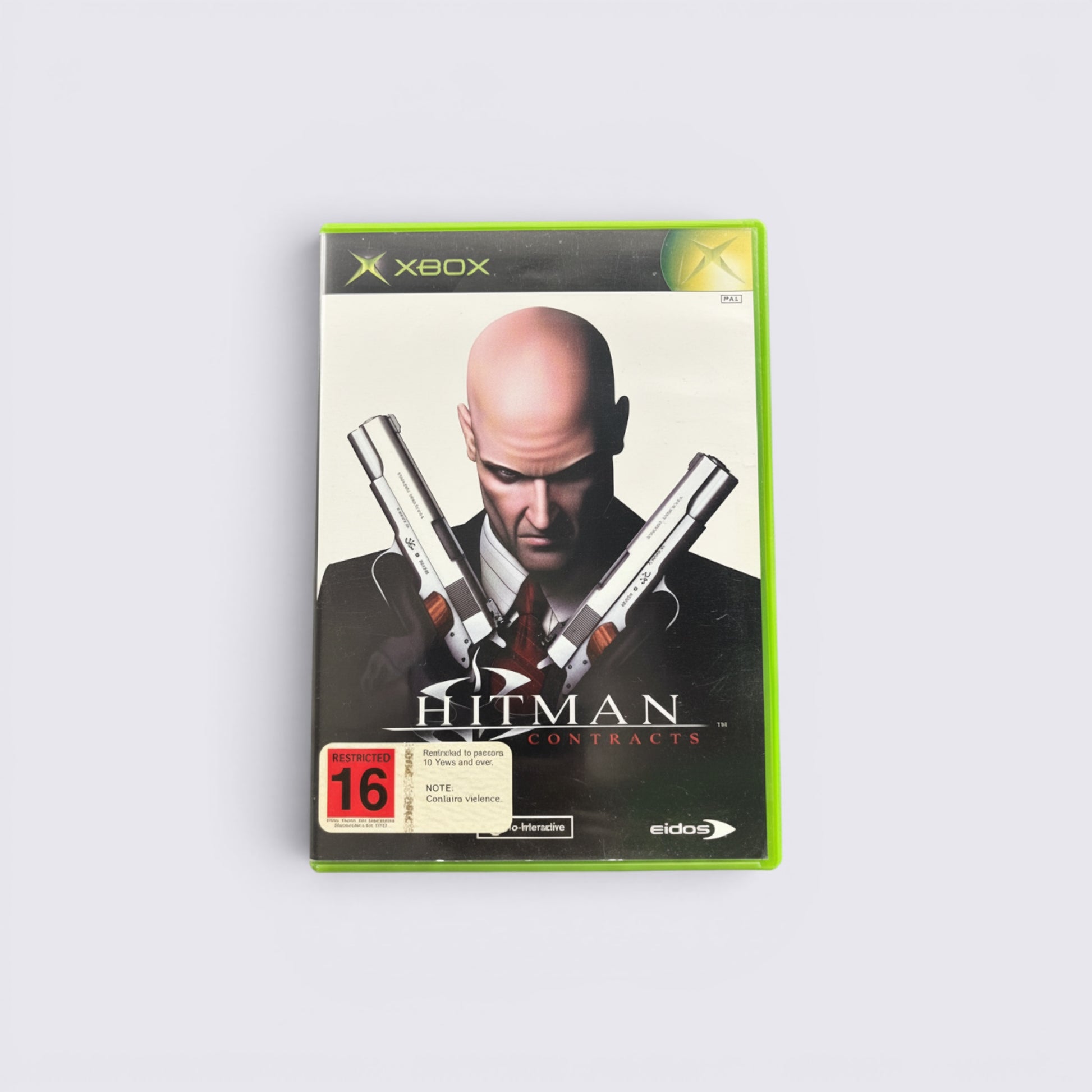 MrPixel Hitman: Contracts Xbox game case featuring Agent 47 holding two silver pistols on the cover art.