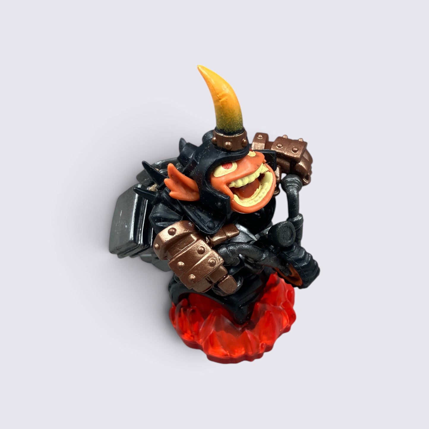 MrPixel Hog Wild Fryno Skylanders figure with black armor, yellow horn, and translucent red fire base.