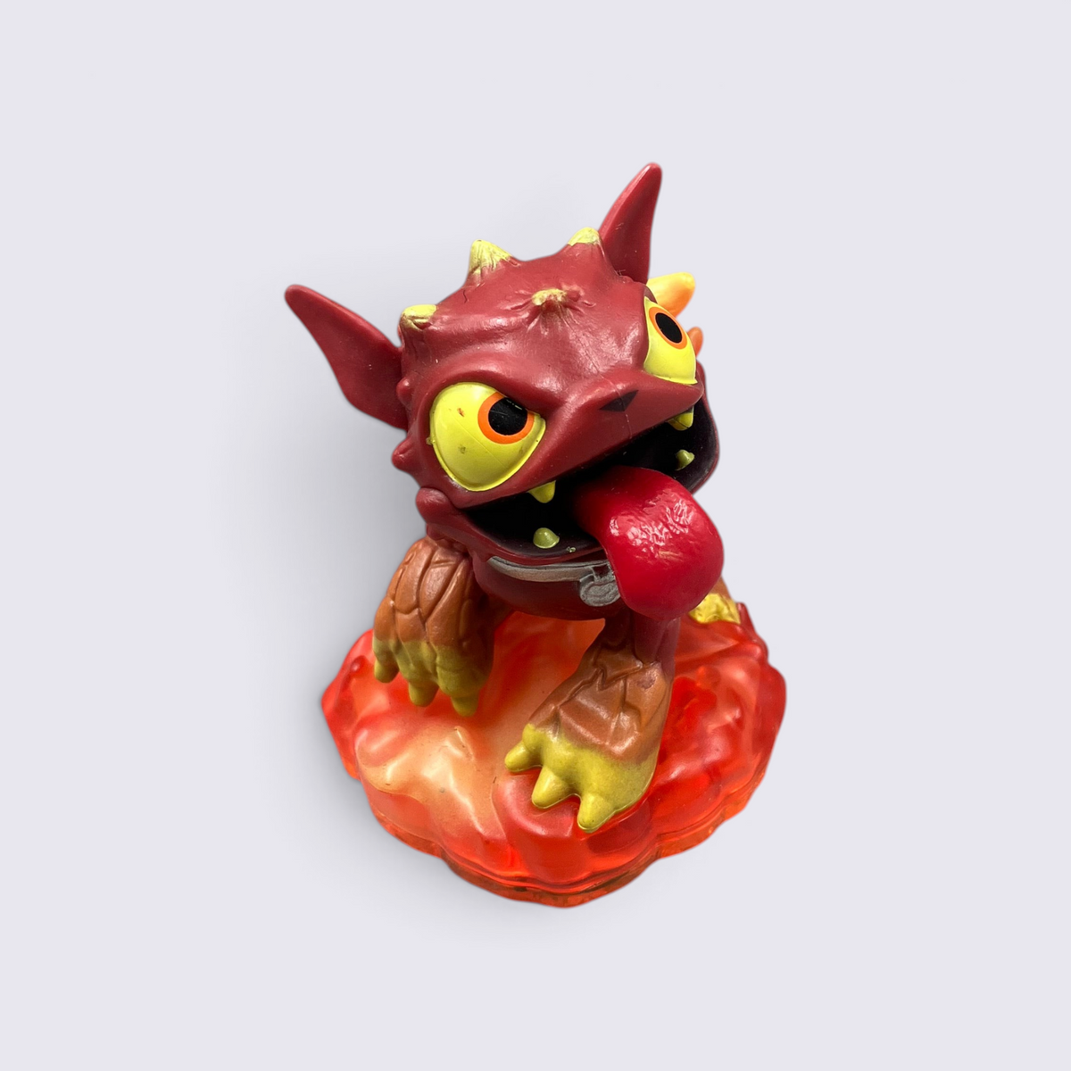 MrPixel Hot Dog Skylander figure featuring a red and yellow flame-themed canine character on a translucent base.