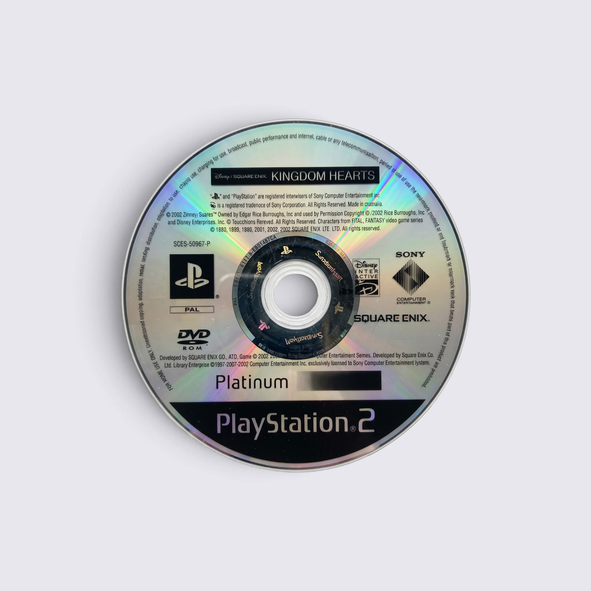 MrPixel Kingdom Hearts Platinum edition PlayStation 2 game disc featuring silver reflective surface and black text