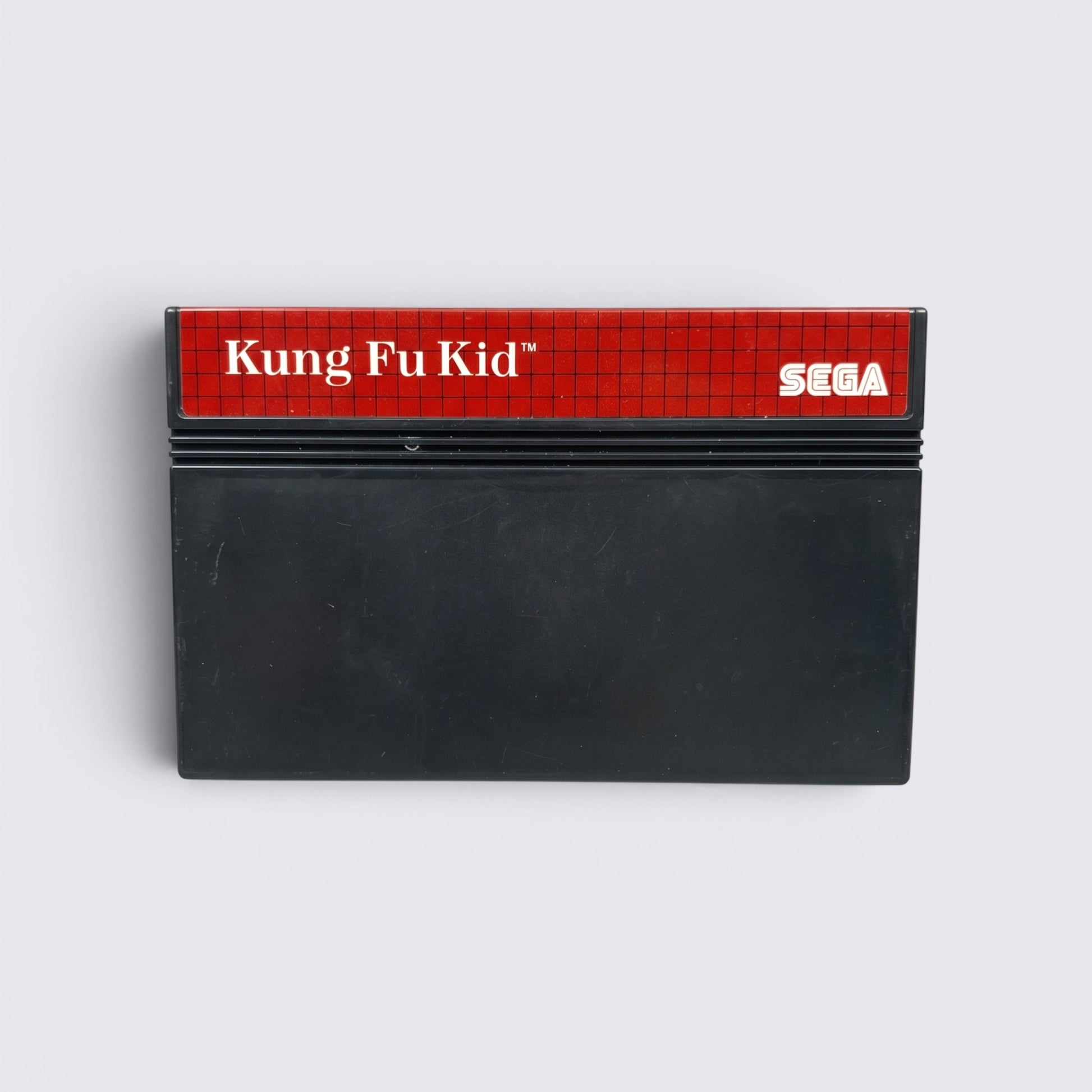 MrPixel Kung Fu Kid SEGA Master System game cartridge with red grid label and black plastic casing.