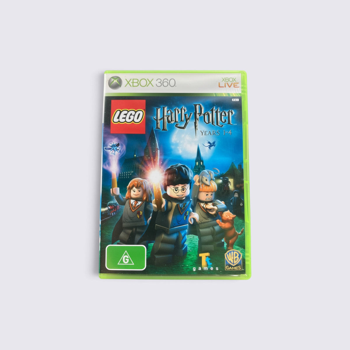 MrPixel LEGO Harry Potter Years 1-4 Xbox 360 game case featuring Harry, Ron, and Hermione with wands at Hogwarts.