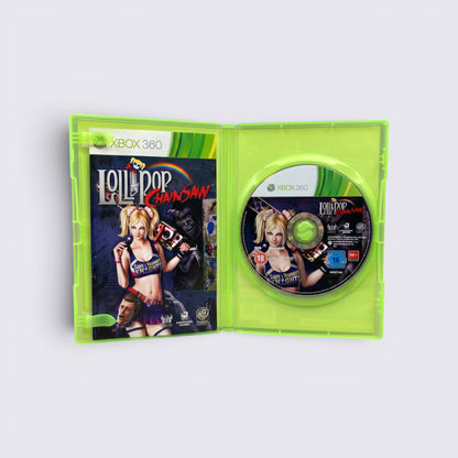 MrPixel Lollipop Chainsaw Xbox 360 game case open showing the game disc and cover art featuring Juliet Starling.
