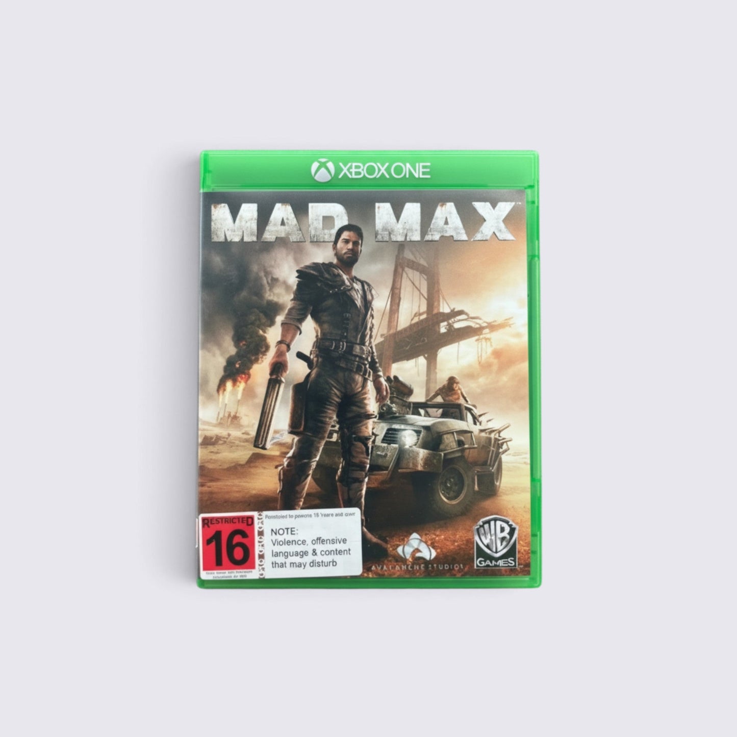MrPixel Mad Max video game for Xbox One featuring the road warrior standing in a post-apocalyptic wasteland.