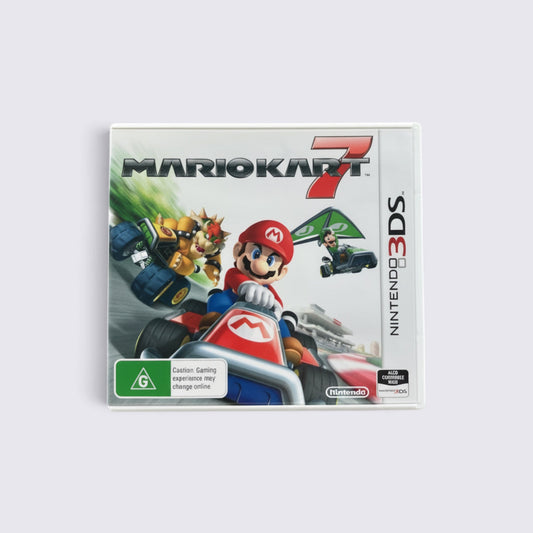 MrPixel Mario Kart 7 Nintendo 3DS game case featuring Mario, Bowser, and Luigi racing with gliders on the cover art.