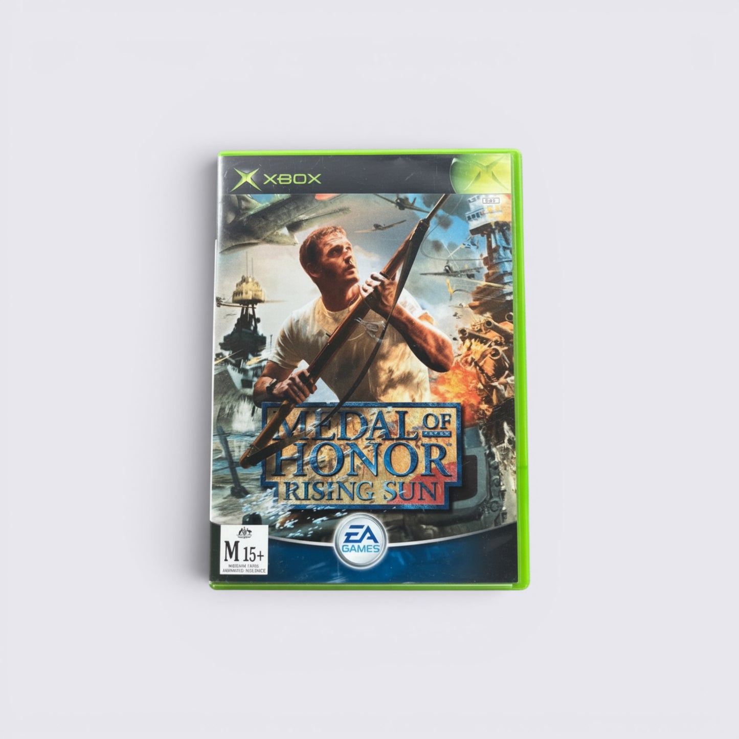 MrPixel Medal of Honor: Rising Sun Xbox game case featuring a soldier in a Pacific theatre WWII battle scene.