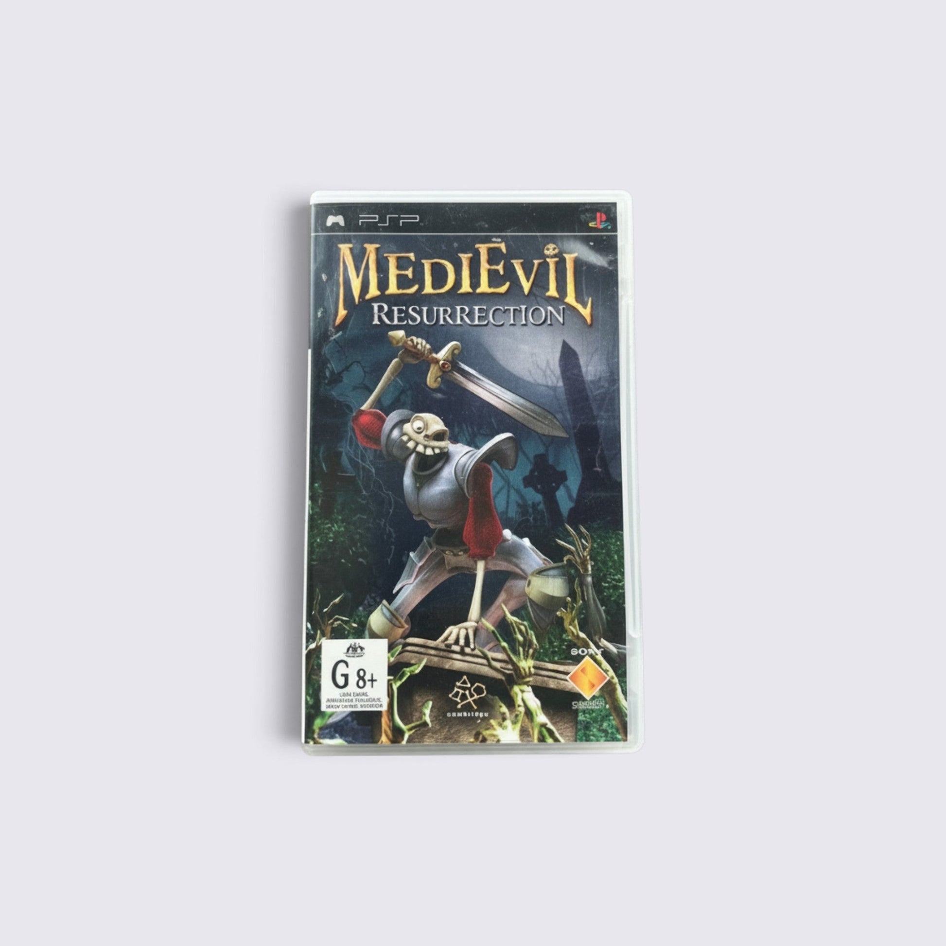 MrPixel MediEvil: Resurrection PSP game case featuring Sir Daniel Fortesque in a gothic graveyard setting