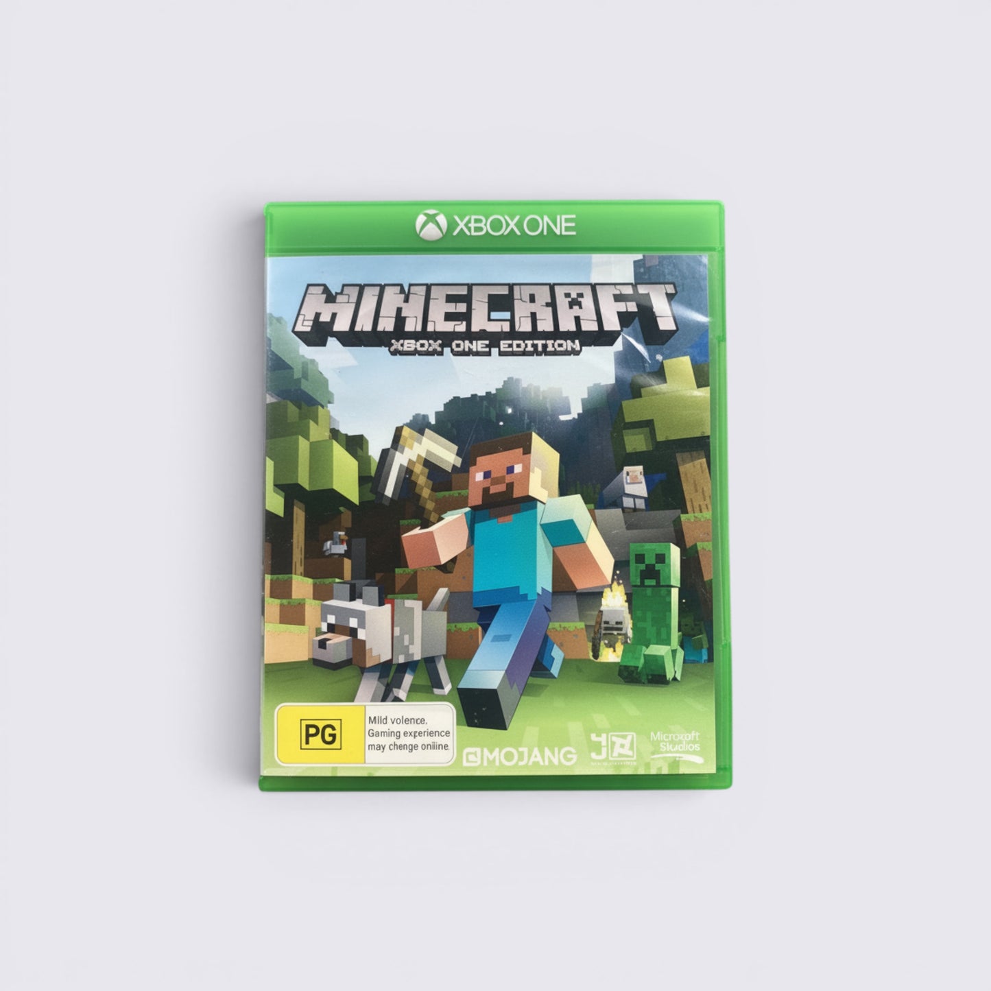 MrPixel Minecraft Xbox One Edition game case featuring Steve, a wolf, and a Creeper in a blocky landscape.
