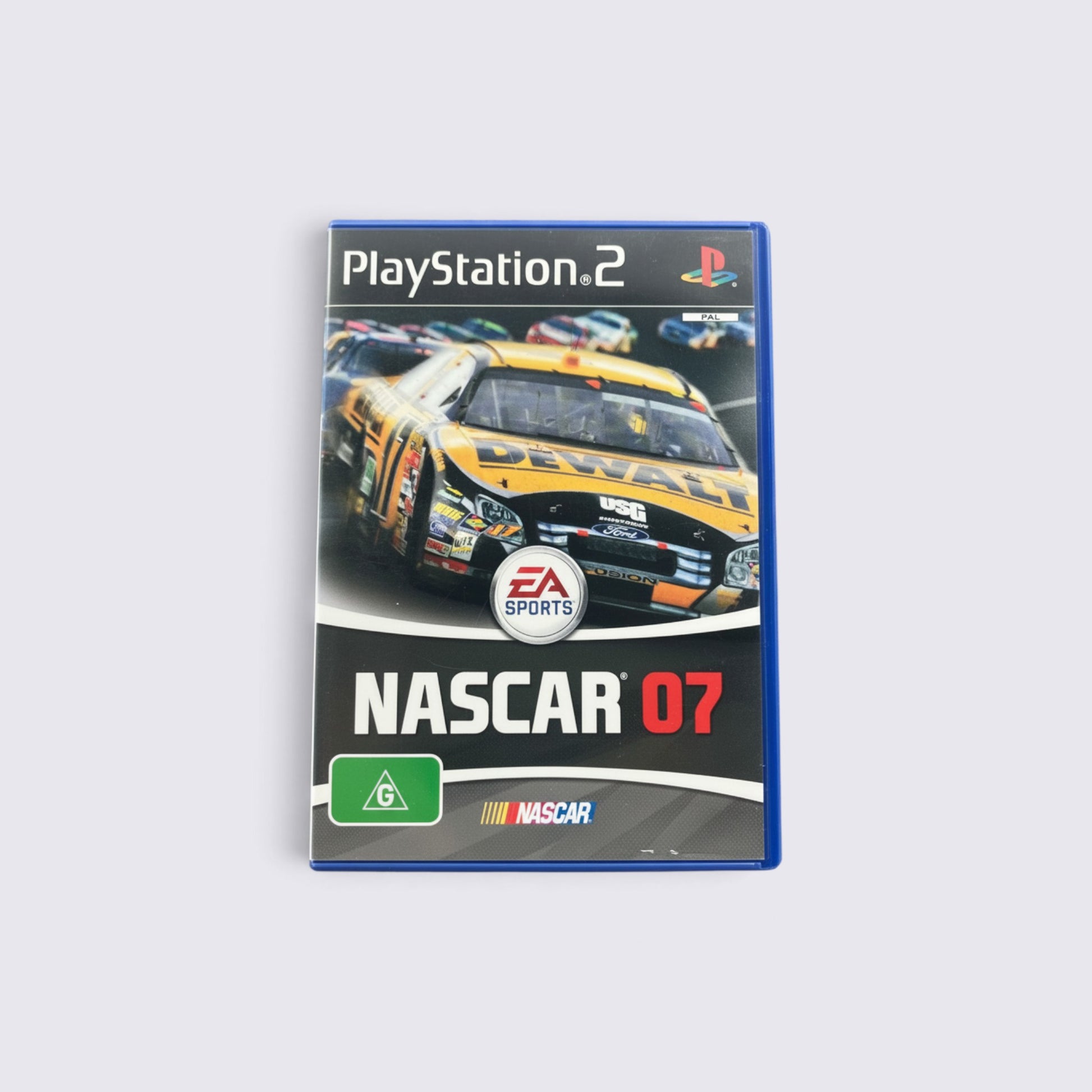 MrPixel NASCAR 07 PlayStation 2 game case featuring a yellow DeWalt stock car on a racing track