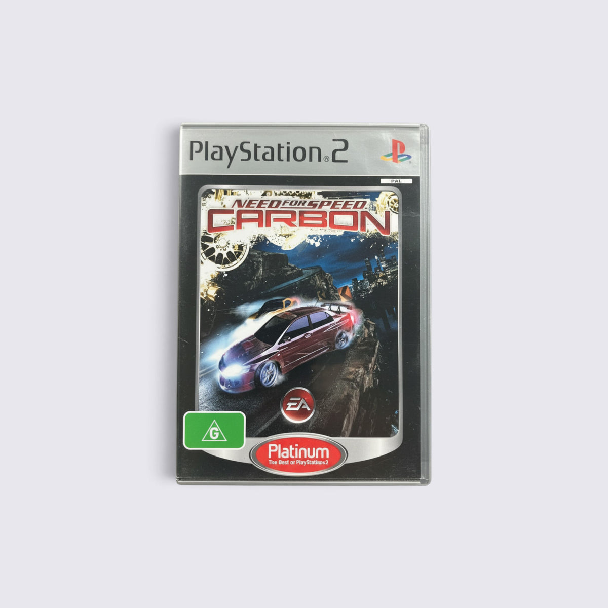 MrPixel Need for Speed Carbon Platinum edition game for PlayStation 2 featuring a racing car on a canyon road