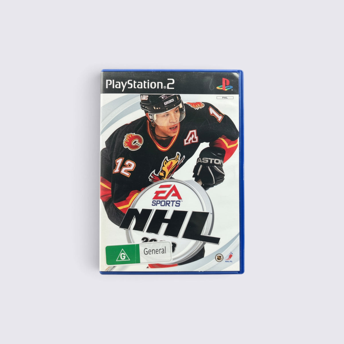 MrPixel NHL 2003 PlayStation 2 game case featuring a Calgary Flames player on the cover