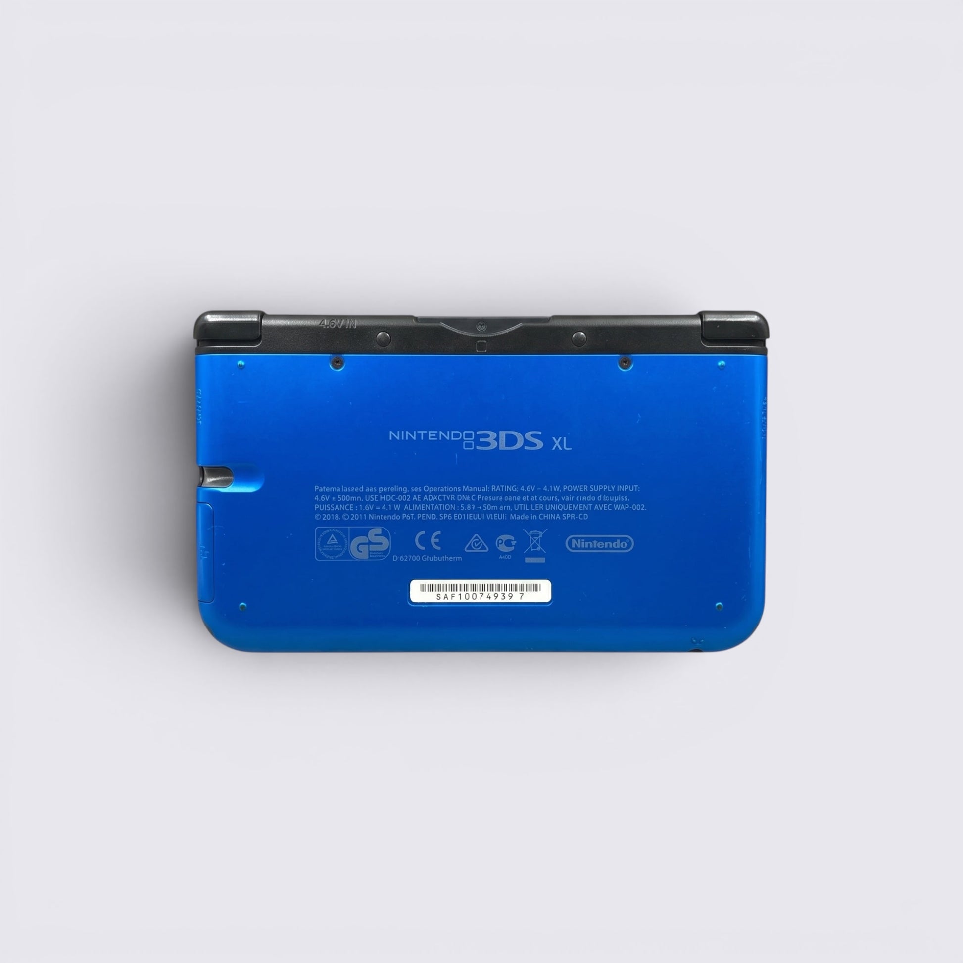 MrPixel Nintendo 3DS XL handheld gaming console in metallic blue and black, rear view showing model details.