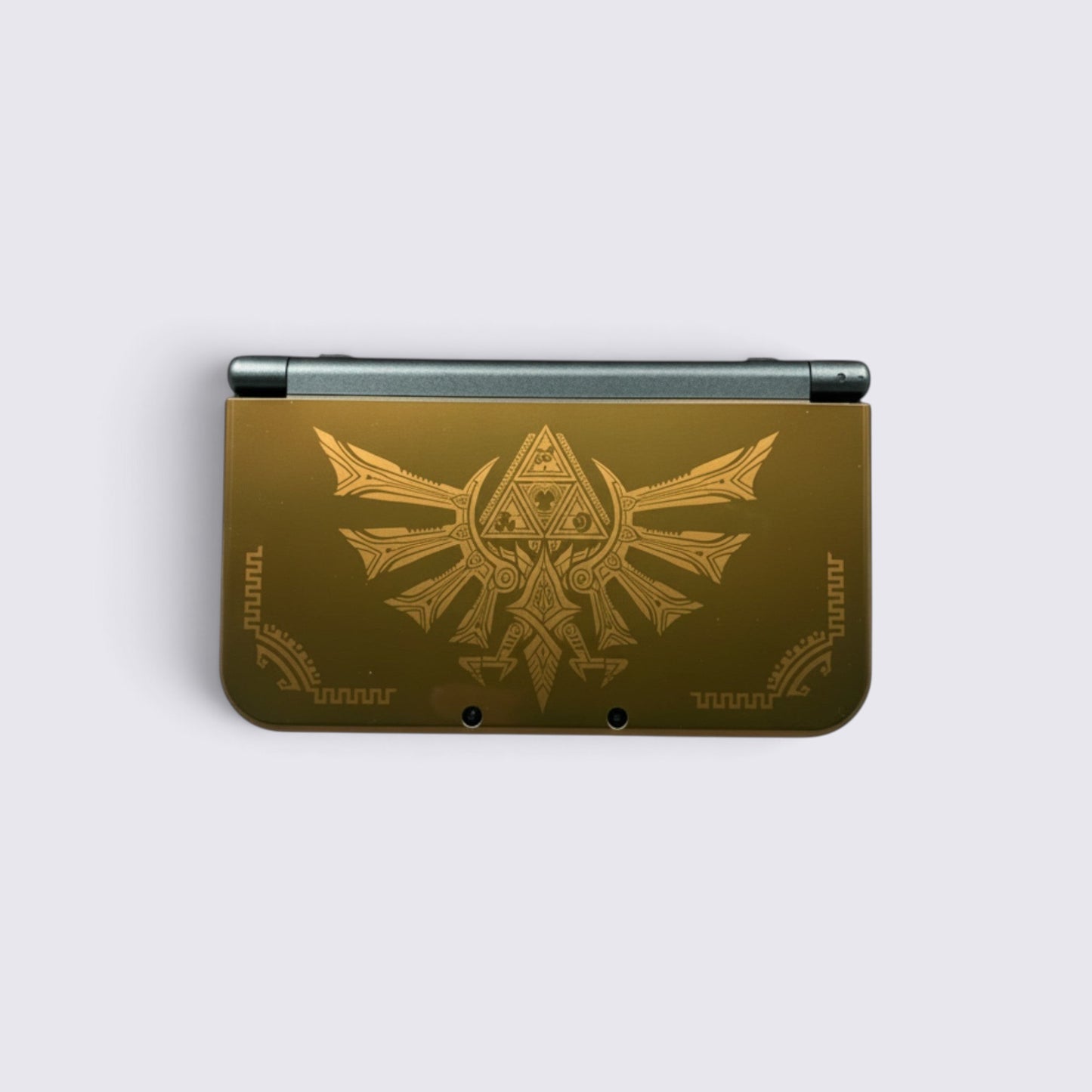 MrPixel New Nintendo 3DS XL Hyrule Edition console in gold with Hylian Crest and Triforce symbols on the cover