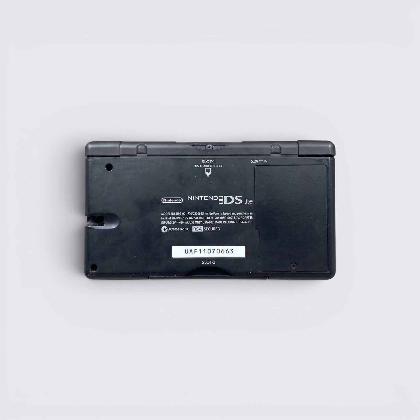 MrPixel Nintendo DS Lite Guitar Hero Edition handheld console back view showing model details and serial number
