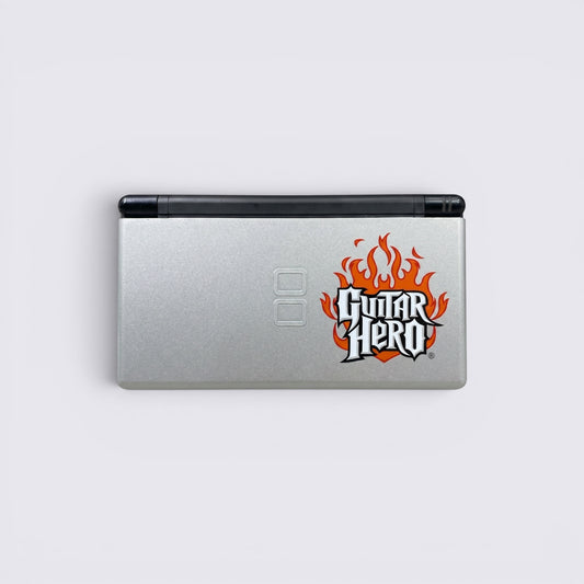 MrPixel Nintendo DS Lite Guitar Hero Edition console in silver with iconic flame logo on the lid