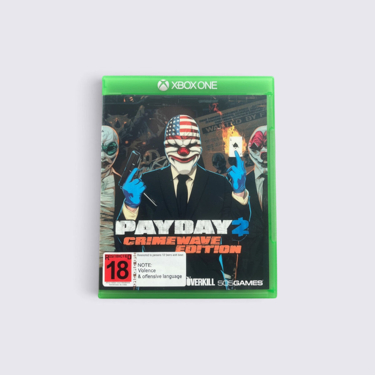 MrPixel PAYDAY 2 Crimewave Edition Xbox One game case featuring masked heist characters in suits