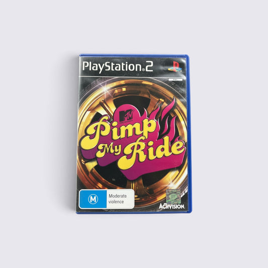 MrPixel Pimp My Ride PlayStation 2 game case featuring a gold wheel and pink flame logo on a dark background
