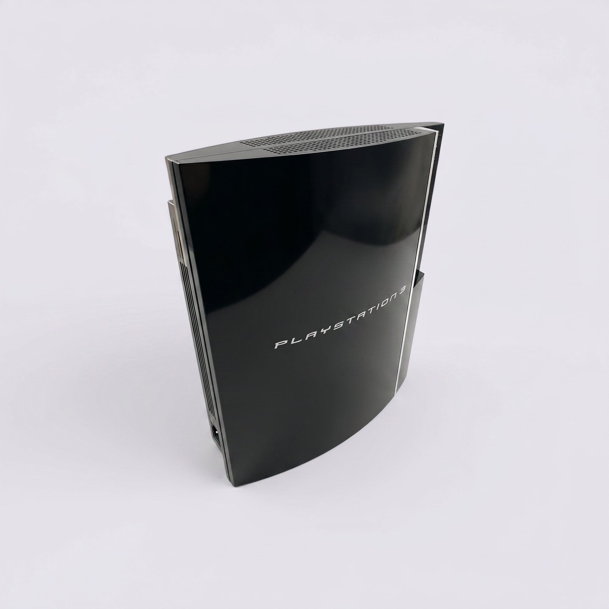 MrPixel glossy black PlayStation 3 fat console with iconic curved design and white logo on a white background
