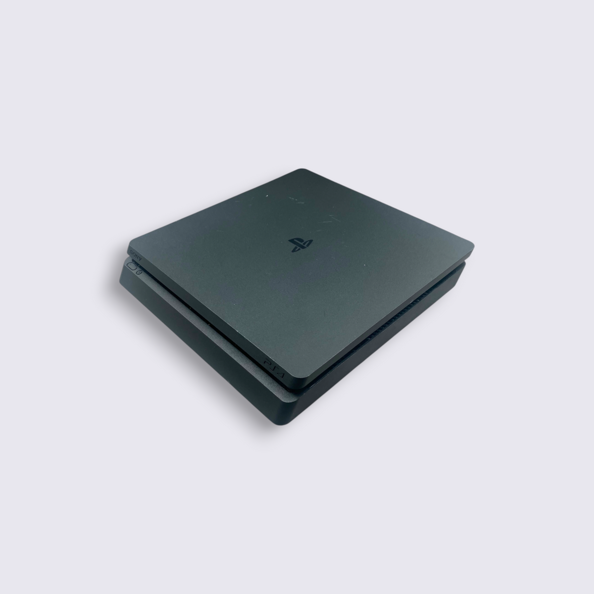 MrPixel PlayStation 4 Slim console in matte black with a compact, lightweight design on a grey surface.