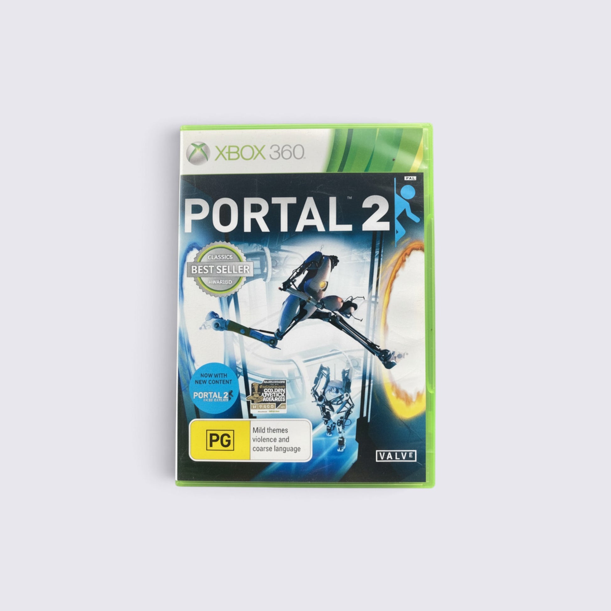MrPixel Portal 2 Xbox 360 game case featuring Atlas and P-Body robots with blue and orange portal graphics.
