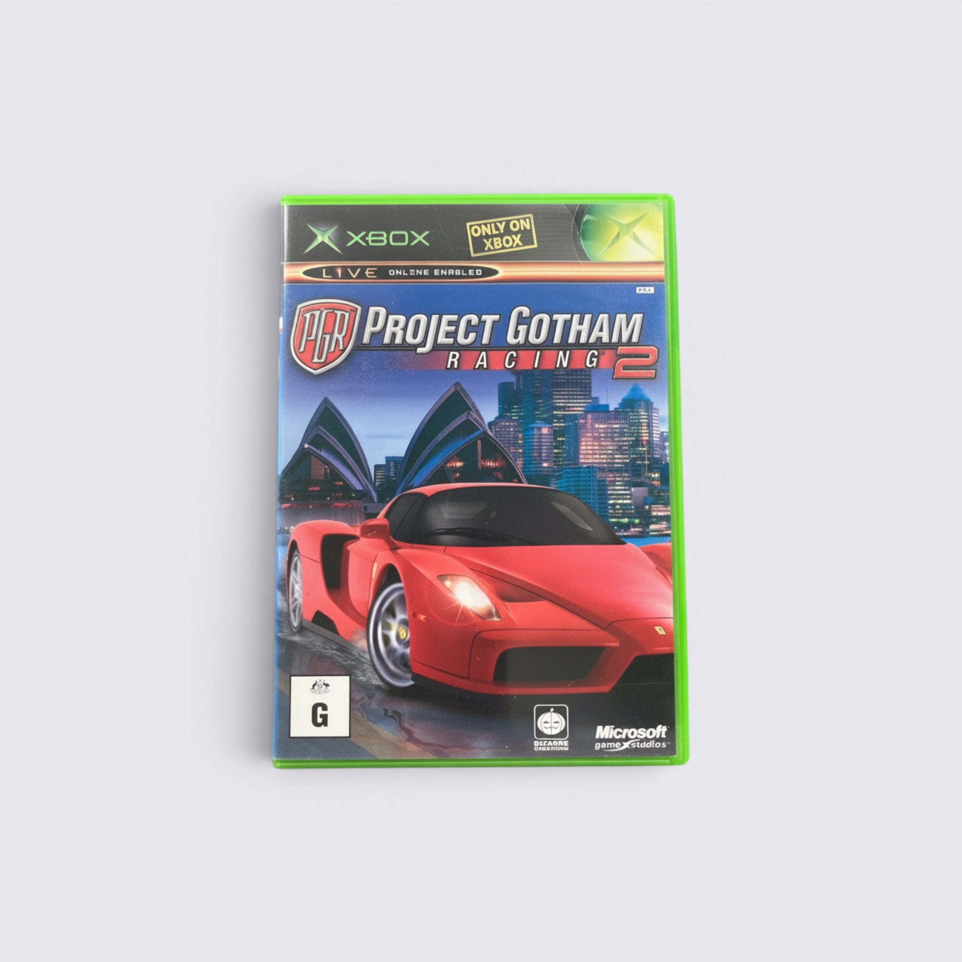 MrPixel Project Gotham Racing 2 Xbox game case featuring a red Ferrari sports car against a Sydney city skyline.