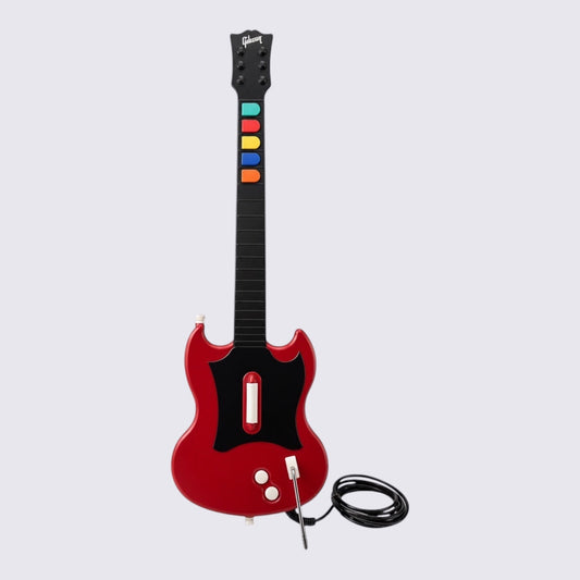 MrPixel red wired Guitar Hero SG controller for PlayStation 2 with fret buttons, strum bar, and whammy bar.